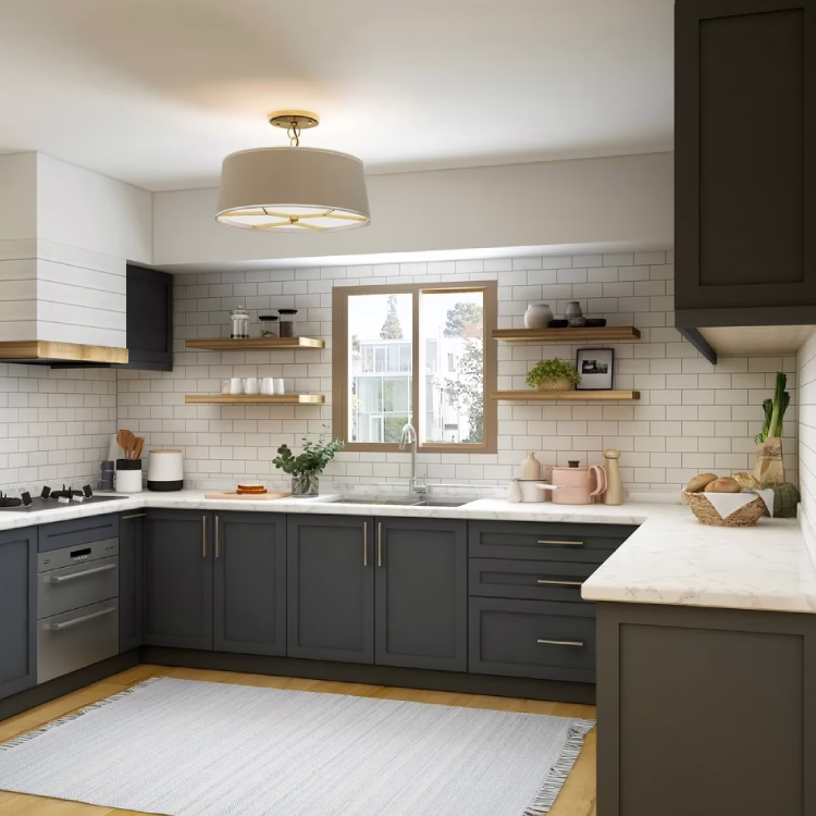 Best kitchen renovation company in Toronto transforming a bright, modern kitchen with white cabinetry, quartz counters, and stainless steel.