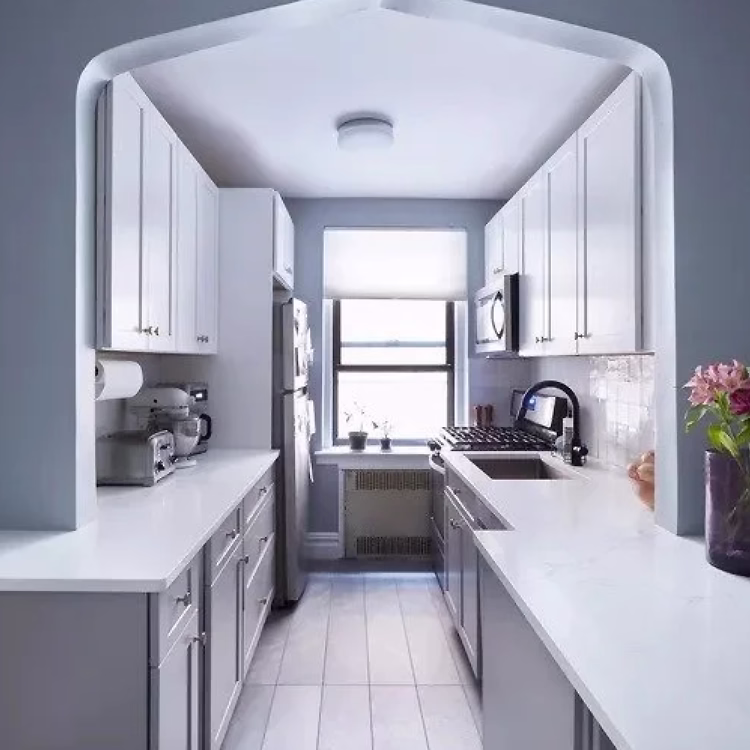 Stylish Toronto galley kitchen design combining practicality, high-end materials, and a bright open feel.