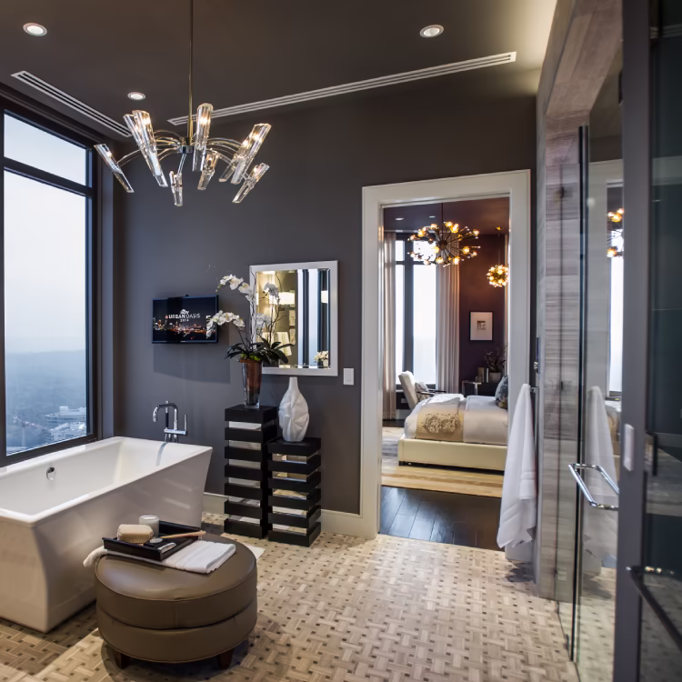 Luxury condo bathroom featuring marble accents, soft lighting, and a spa-like atmosphere.