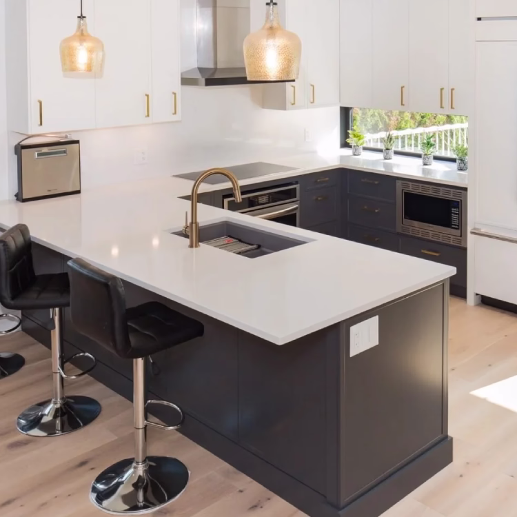 Contemporary Toronto kitchen remodel with a peninsula layout for added workspace and seating.